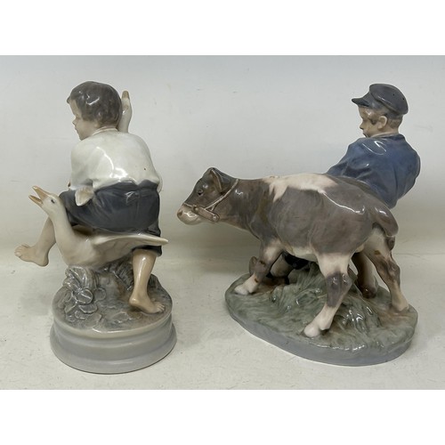 742 - A Royal Copenhagen figure of a young boy struggling with a cow, and a young boy with two geese, 20 c... 