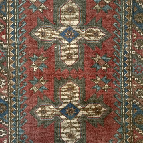 965 - A red ground runner, 275 x 75 cm, and a cream ground runner, 300 x 70 cm (2)