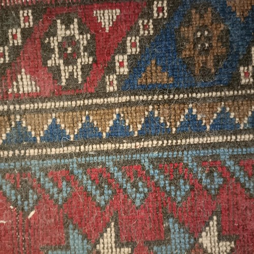 965 - A red ground runner, 275 x 75 cm, and a cream ground runner, 300 x 70 cm (2)