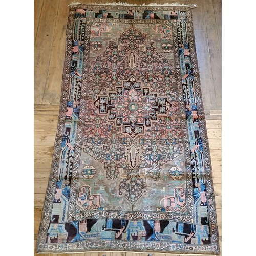 967 - A Persian style red ground carpet, 286 x 155 cm