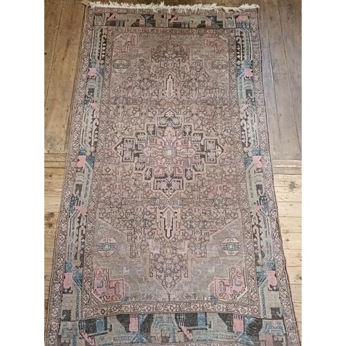 967 - A Persian style red ground carpet, 286 x 155 cm