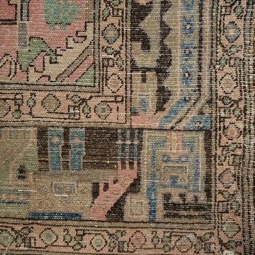 967 - A Persian style red ground carpet, 286 x 155 cm