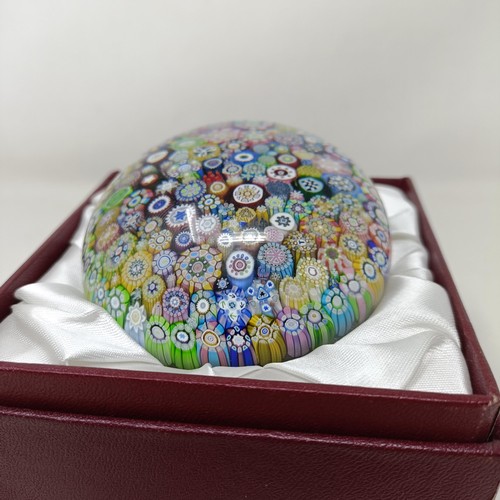 791 - A Perthshire glass millefiori paperweight, 7 cm diameter, boxed