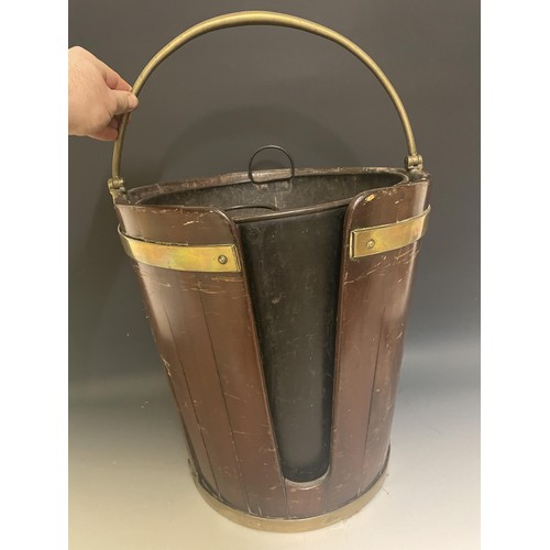 895 - A 19th century mahogany and brass bound plate bucket, with a swing handle, 30 cm diameter