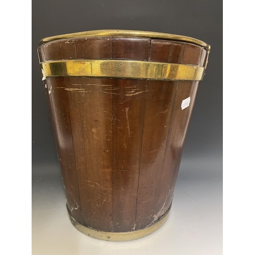 895 - A 19th century mahogany and brass bound plate bucket, with a swing handle, 30 cm diameter