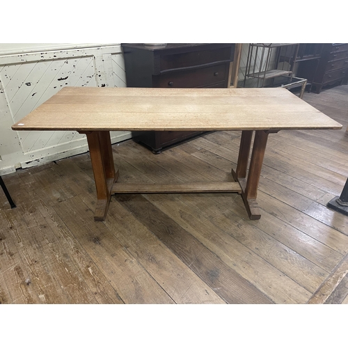 968 - An oak dining table, the top 184 x 90 cm