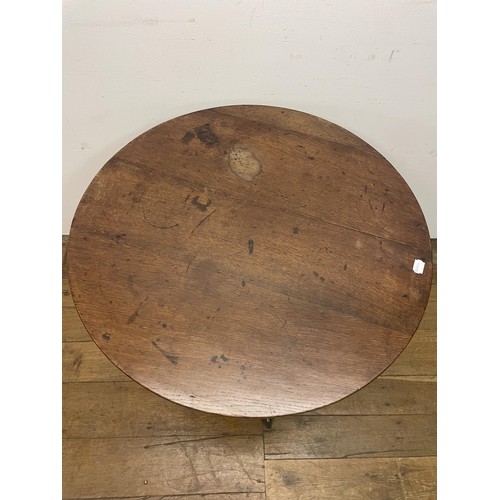 872 - A mahogany wine table, on a tripod base, 76 cm diameter