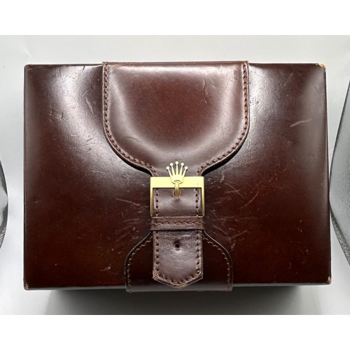 320 - A vintage leather Rolex box, 21 cm wide