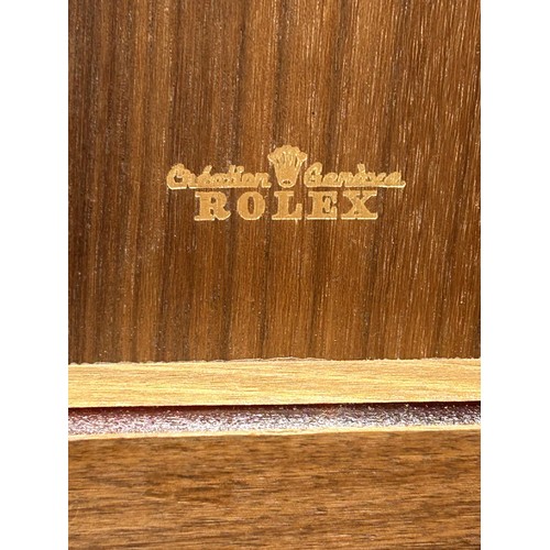 320 - A vintage leather Rolex box, 21 cm wide