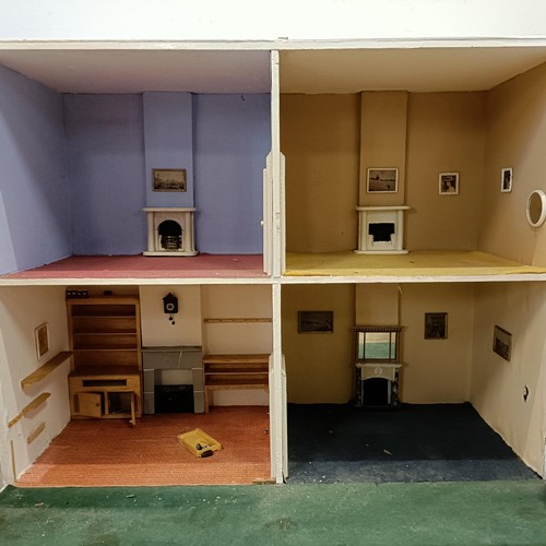 734 - A painted dolls house, 73 cm high x 81 cm wide