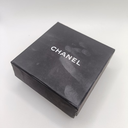 237 - A modern Chanel brooch in the form of a rucksack with a pickaxe, boxed