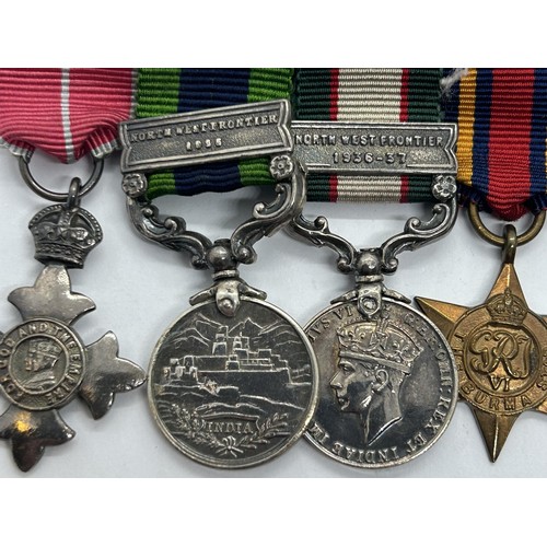 971 - A group of nine miniature medals, comprising an MBE, an India General Service Medal, with NWF 1935 b... 