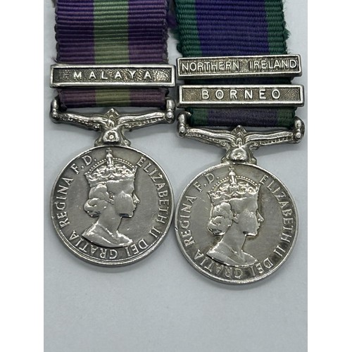 974 - A trio of miniature medals, comprising a Defence Medal, a General Service Medal, with Malaya bar, an... 