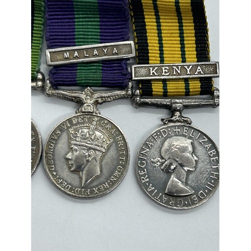 974 - A trio of miniature medals, comprising a Defence Medal, a General Service Medal, with Malaya bar, an... 