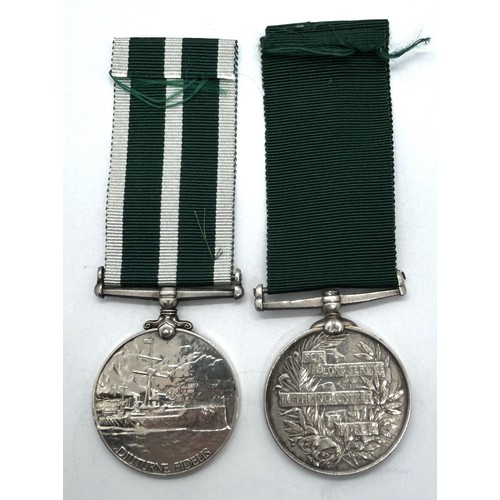 944 - A Royal Naval Reserve LS & GC Medal, awarded to 3121 U C Kennedy STO RNR, and a Volunteer Long Servi... 