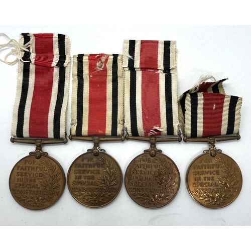 945 - A Special Constabulary Medal, awarded to William Smith, another, awarded to Frederick H Coombes, ano... 