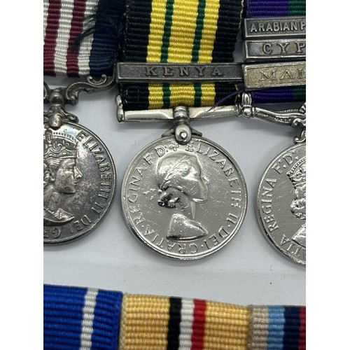 970 - A group of three miniature medals, comprising a MM (QEII), an Africa General Service Medal, with Ken... 