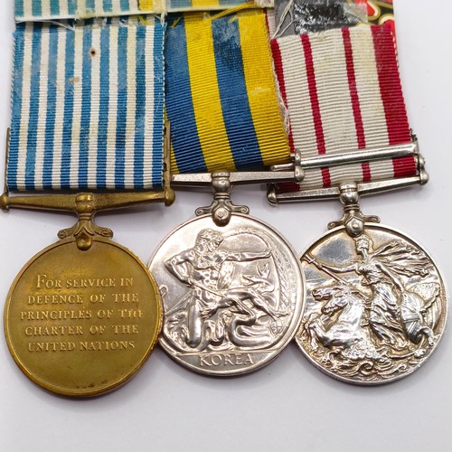 703 - A group of three medals, awarded to P/SSX 849620 R A Lailey ORD TEL RN, comprising a Naval General S... 