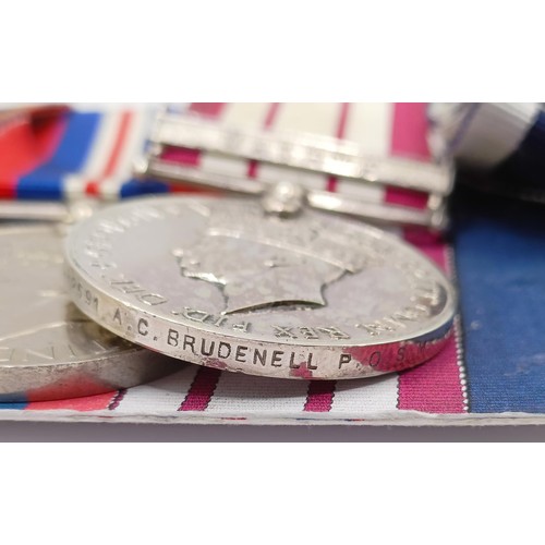 705 - A group of seven medals, awarded to KX 82591 A C Brundenell PO SM RN, comprising a 1939-1945 Star, a... 