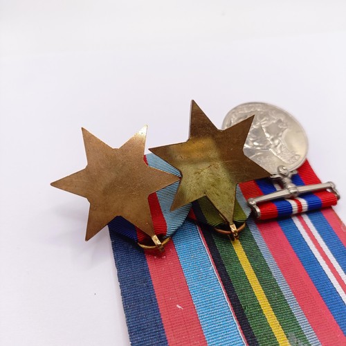 706 - A group of three medals, attributed to P/JX 514456 Thomas Hawkins AB RN, comprising a Pacific Star, ... 