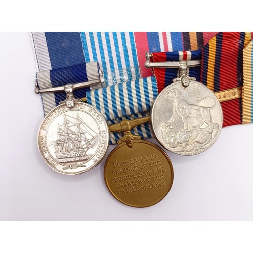 710 - A group of seven medals, awarded to JX 149741 R F Lewington PO HMS Pembroke, comprising a 1939-1945 ... 