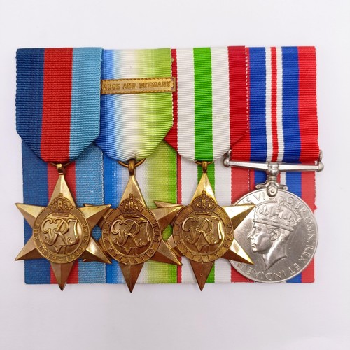 711 - A group of four medals, attributed to CJX 352337 John Edwin Carter AB, comprising a 1939-1945 Star, ... 