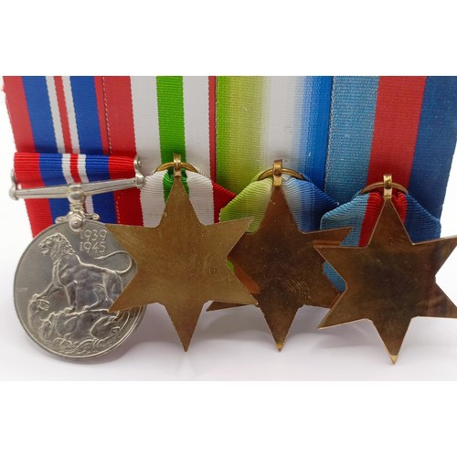 711 - A group of four medals, attributed to CJX 352337 John Edwin Carter AB, comprising a 1939-1945 Star, ... 