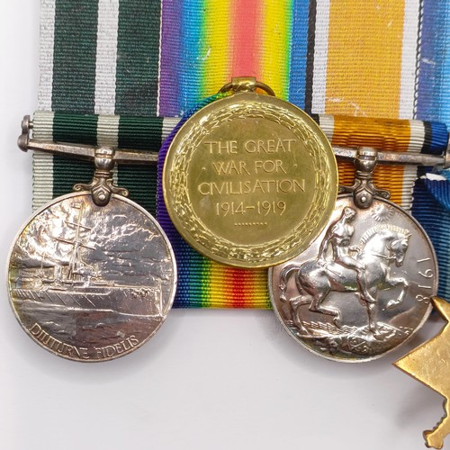 714 - A group of four medals, awarded to C 3562 J Moulton SMN RNR, comprising a 1914-15 Star Trio, and a R... 