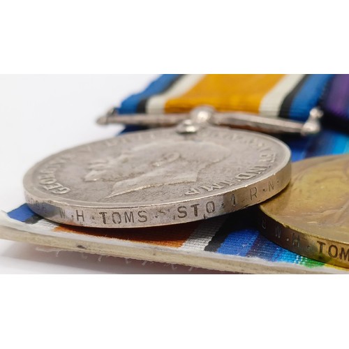 715 - A group of six medals, awarded to K-29098 William Henry Toms STO 1 HMS Iron Duke, comprising a Briti... 