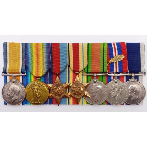 717 - A group of seven medals, awarded to J 73412 A L Draper B Tel RN, comprising a British War Medal, a V... 