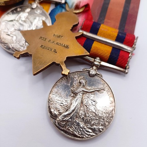 721 - A group of four medals, awarded to 5967 G F Rosam Essex Regiment, comprising a Queen's South Africa ... 