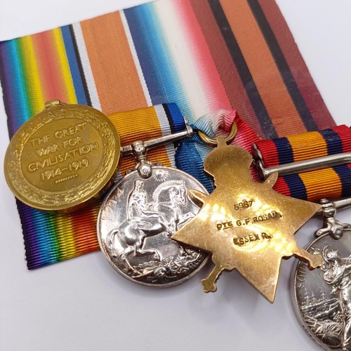 721 - A group of four medals, awarded to 5967 G F Rosam Essex Regiment, comprising a Queen's South Africa ... 