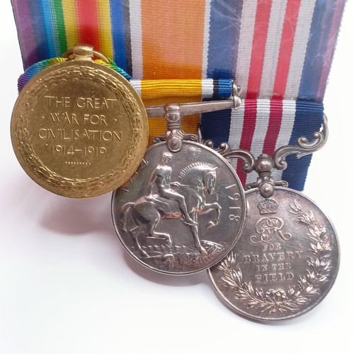 732 - A group of three medals, awarded to 200979 Pte E H Hewitt 20/Durham LI, comprising a Military Medal,... 