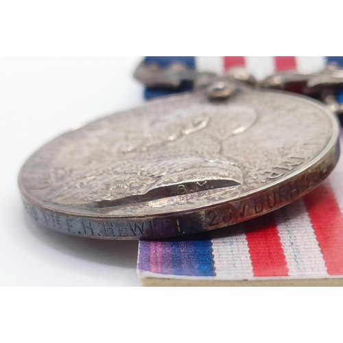 732 - A group of three medals, awarded to 200979 Pte E H Hewitt 20/Durham LI, comprising a Military Medal,... 