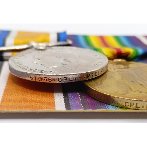 735 - A group of four medals, awarded to 51056 Dvr F Prole RFA, comprising a 1914 Star Trio (worn with pri... 