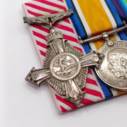 740 - A group of four medals, awarded to 2 Lieut C N C Dickson RAF, comprising an AFC, British War Medal, ... 