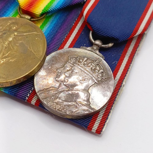 740 - A group of four medals, awarded to 2 Lieut C N C Dickson RAF, comprising an AFC, British War Medal, ... 