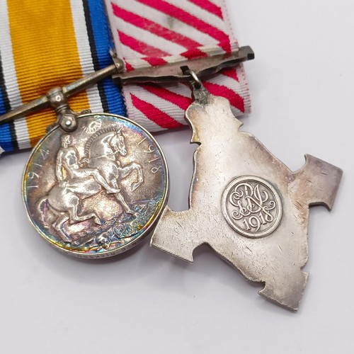 740 - A group of four medals, awarded to 2 Lieut C N C Dickson RAF, comprising an AFC, British War Medal, ... 