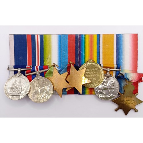 755 - A group of seven medals, awarded to K 7486 C T Warrey Sto 1 RN  Provenance:  From a lifetime of meda... 