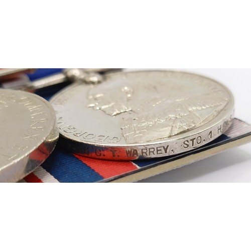 755 - A group of seven medals, awarded to K 7486 C T Warrey Sto 1 RN  Provenance:  From a lifetime of meda... 