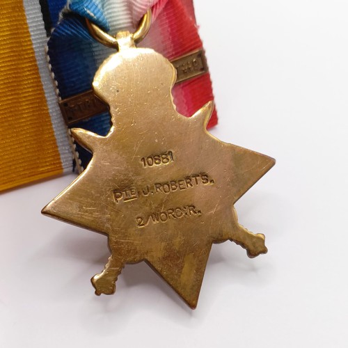 766 - A 1914-15 Star Trio, with Mons bar, awarded to 10881 Pte J Roberts 2 Worcs R Provenance:  From a lif... 