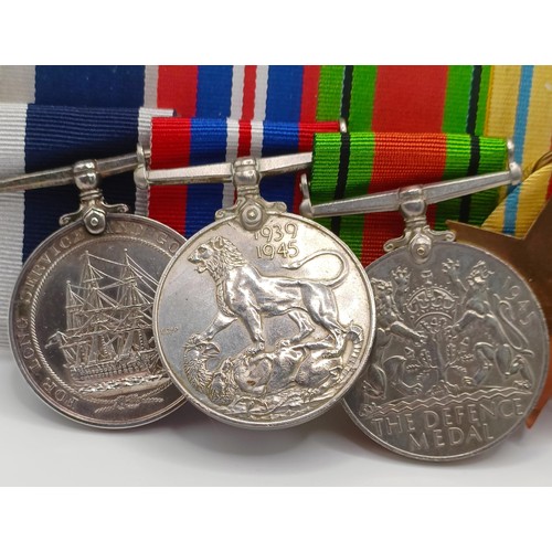 781 - A group of eight medals, awarded to J 18053 P J Scott AB RN, comprising a 1914-15 Star Trio (worn wi... 