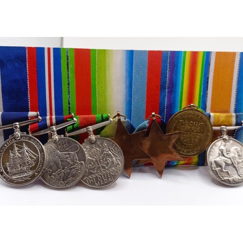 785 - A group of eight medals, awarded to J.3097 W H Oates LS RN, comprising a 1914-15 Star Trio (worn wit... 