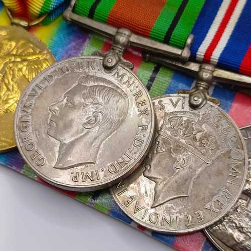 798 - A group of seven medals, awarded to RMB 97 Mus S Jones, comprising a 1914-15 Star Trio, a Defence Me... 