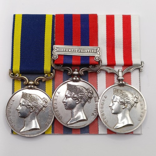 803 - A group of three medals, awarded to Ensign J Perkins 71st Bengal NI, comprising a Punjab Medal, an I... 