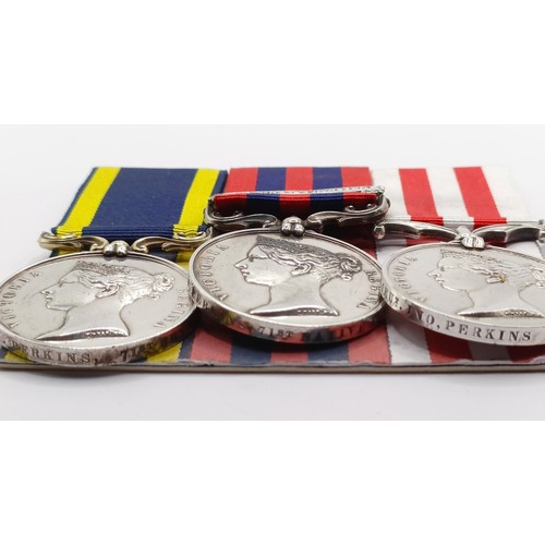 803 - A group of three medals, awarded to Ensign J Perkins 71st Bengal NI, comprising a Punjab Medal, an I... 