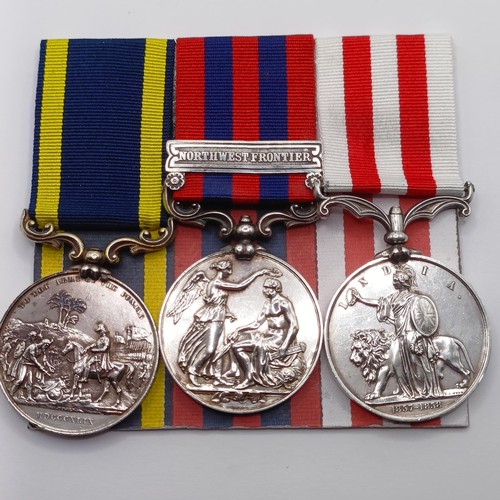 803 - A group of three medals, awarded to Ensign J Perkins 71st Bengal NI, comprising a Punjab Medal, an I... 