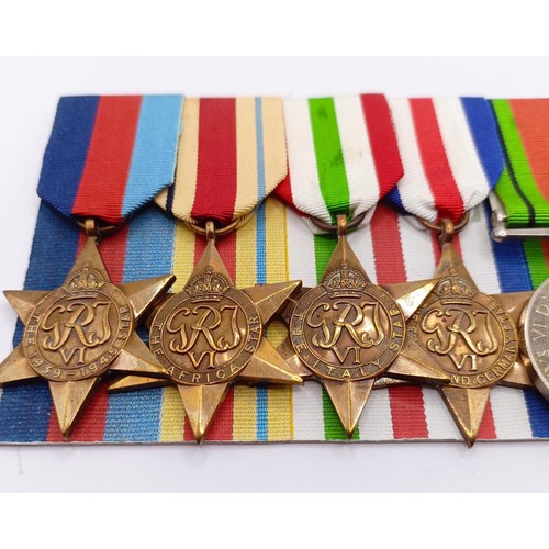 807 - A group of seven medals, awarded to W/O E Limerick (510502) RAF, comprising a 1939-1945 Star, an Afr... 