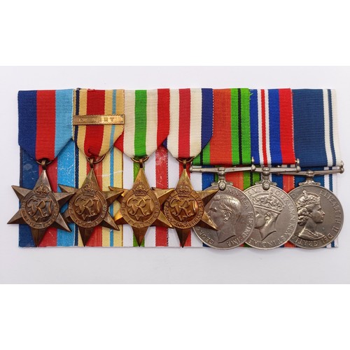 808 - A group of seven medals, awarded to Const David W Austin, comprising a 1939-1945 Star, an Africa Sta... 