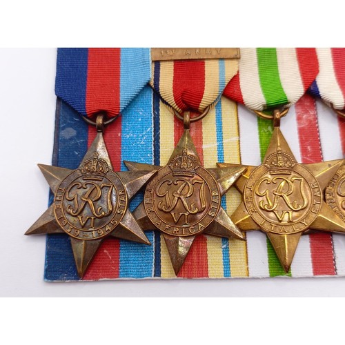 808 - A group of seven medals, awarded to Const David W Austin, comprising a 1939-1945 Star, an Africa Sta... 